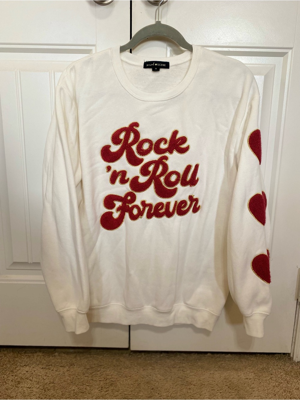Social Scene heart stitch rock and roll sweater M